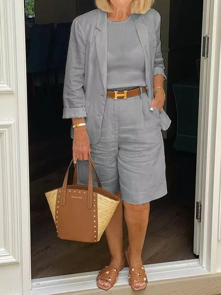 Stylish women's summer jacket & shorts set. Comfortable two-piece outfit, perfect for effortless warm weather casual style.