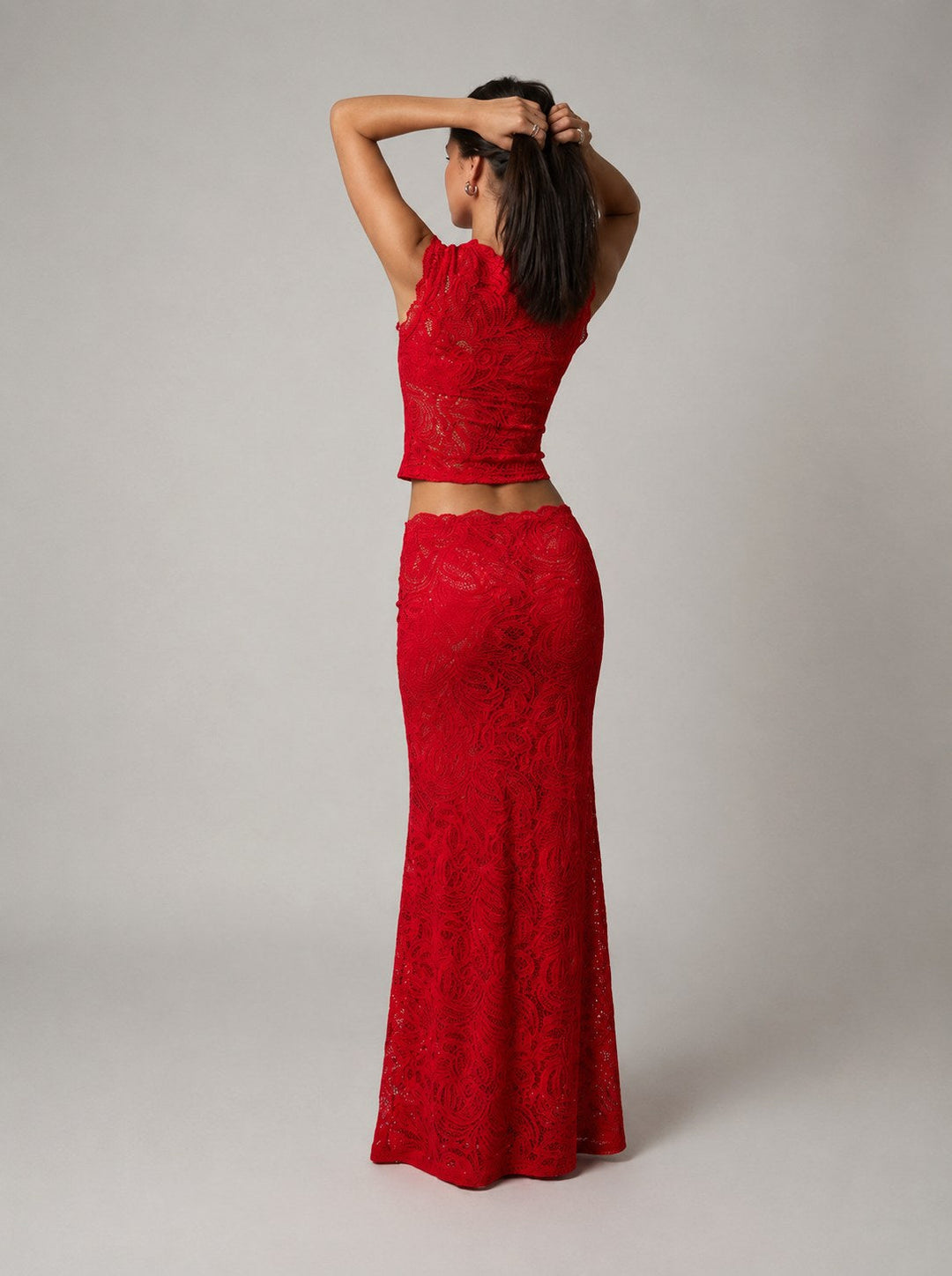 Stylish women's sleeveless floral crop top and maxi skirt set, ideal for parties or formal summer events.