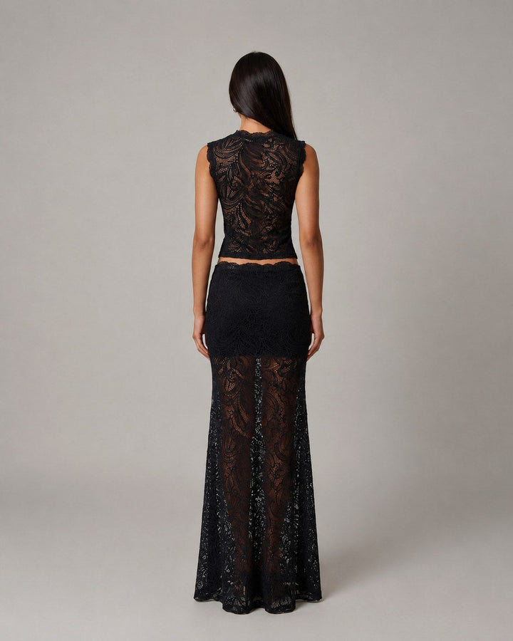 Fashionable women's sleeveless floral crop top & maxi skirt two-piece set, suitable for elegant party wear.