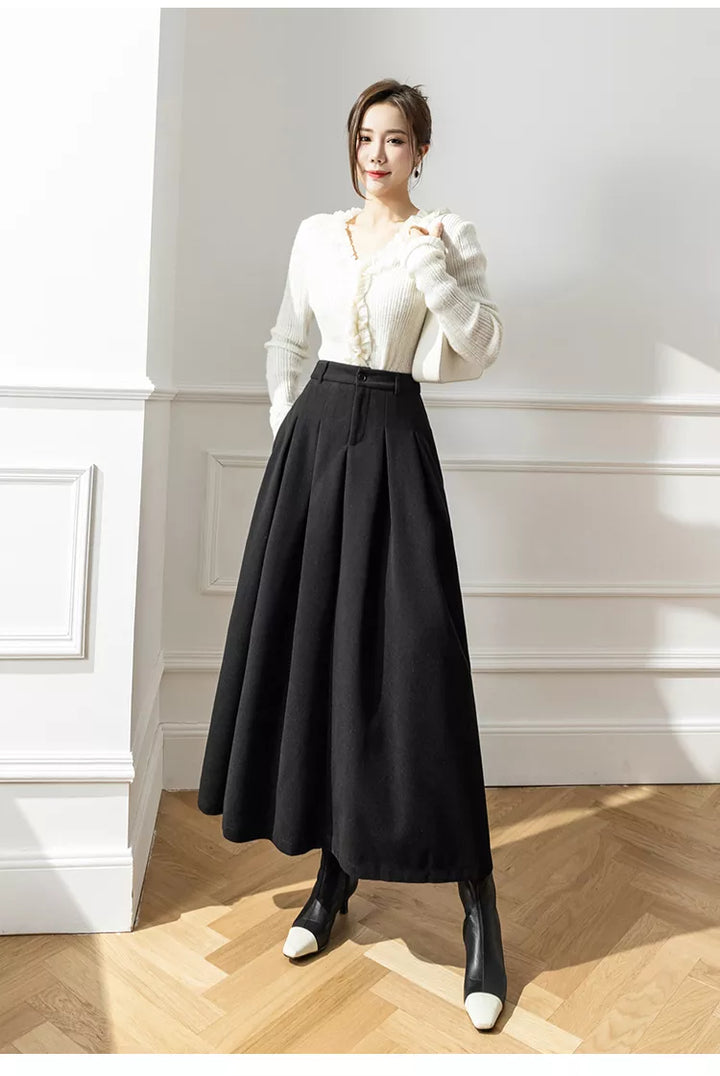 Elegant women's brown pleated A-line midi skirt, versatile for autumn and winter fashion.