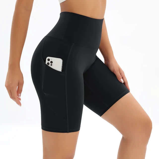 Stylish women's polished high-waisted compression bike shorts with convenient side pockets.