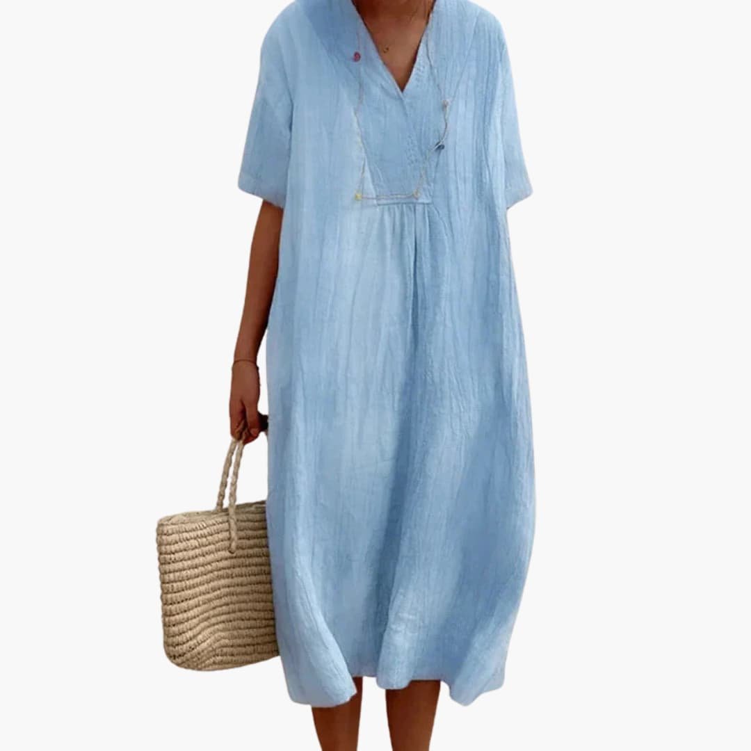 Women's refined relaxed V-neck midi dress for effortless style; a comfortable summer and casual day dress.