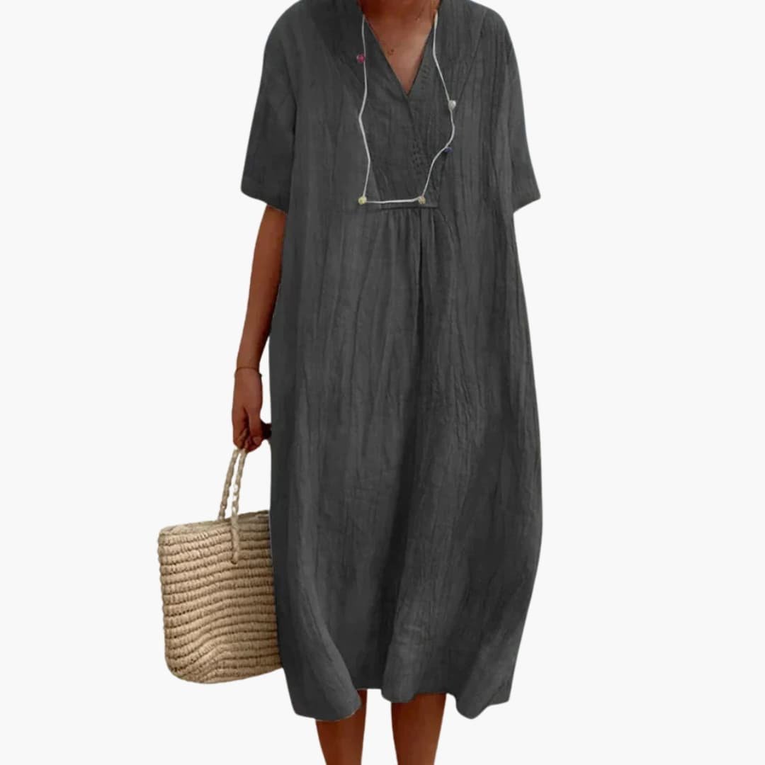 Versatile women's V-neck midi dress; a relaxed linen blend day dress perfect for summer and travel.