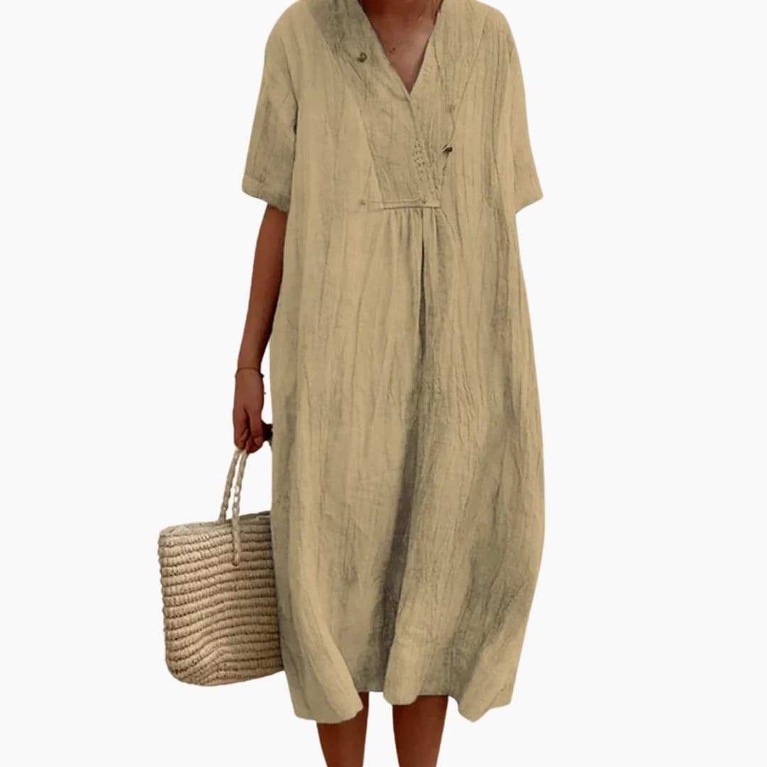 Breathable linen V-neck midi dress for women, featuring a relaxed fit, perfect for elegant summer days.