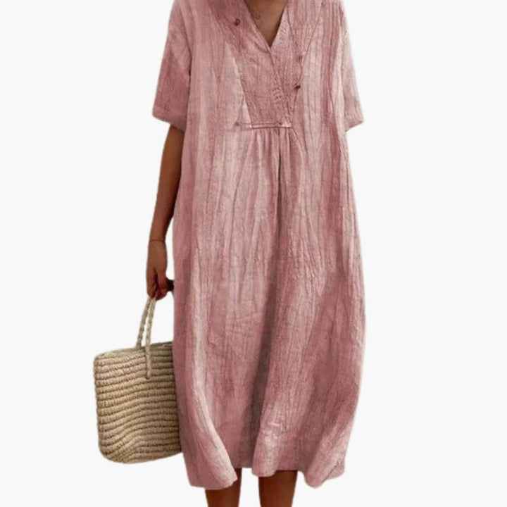 Effortless style with this women's relaxed fit V-neck midi dress; a perfect casual or elegant summer option.