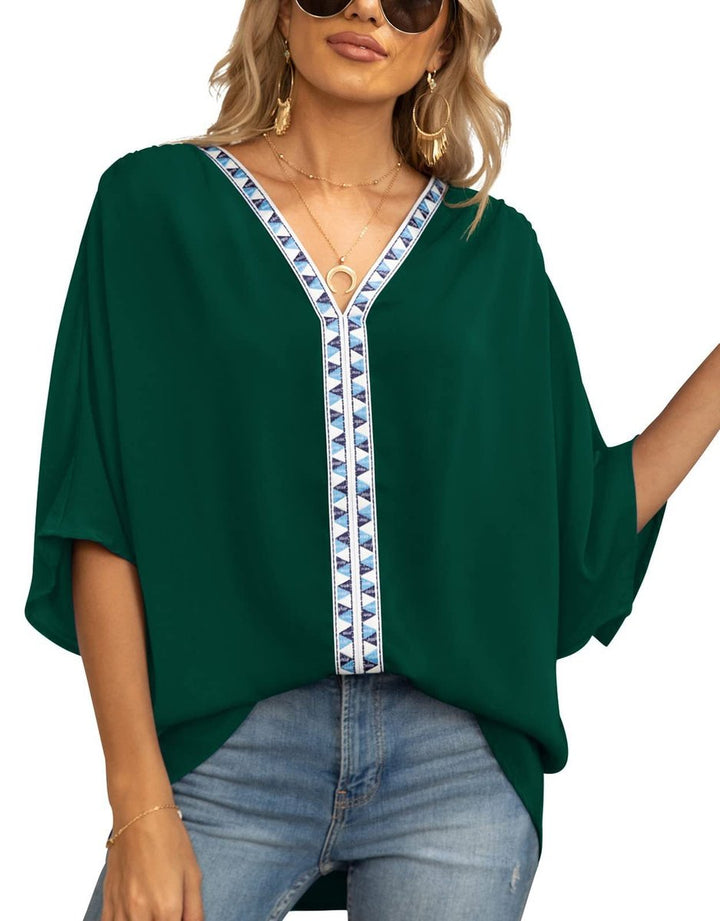 Chic boho embroidered oversized V-neck tunic for women, ideal for a relaxed spring look.