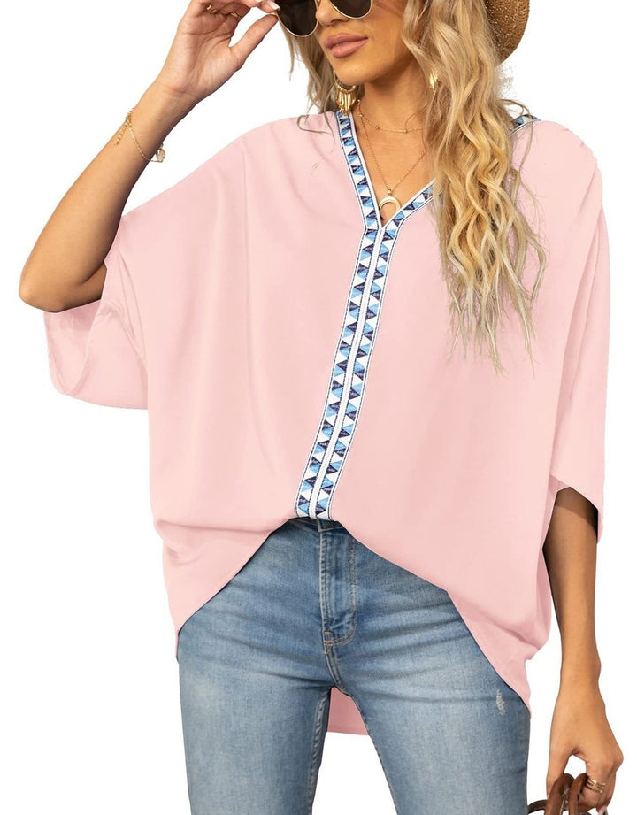 Stylish V-neck embroidered tunic for women, a comfortable oversized top for casual wear.