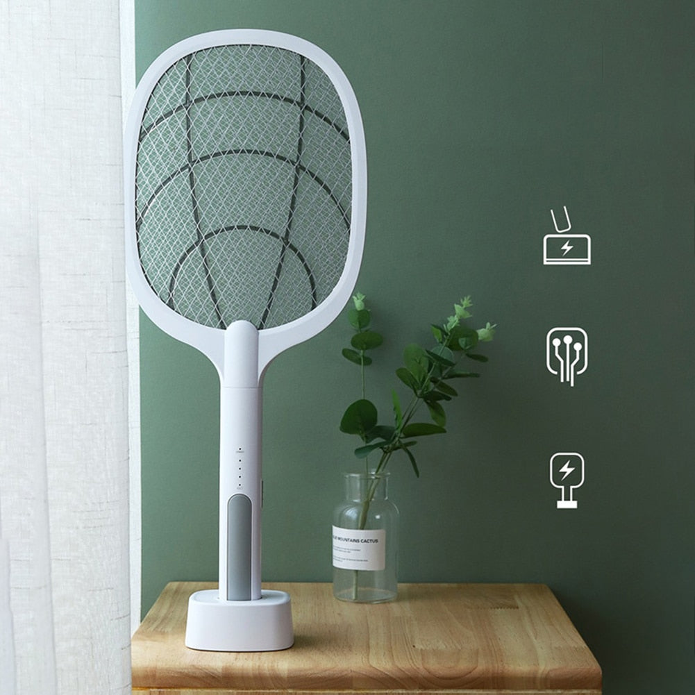 Electric bug zapper racket with LED lure, USB rechargeable mosquito swatter for night pest control.