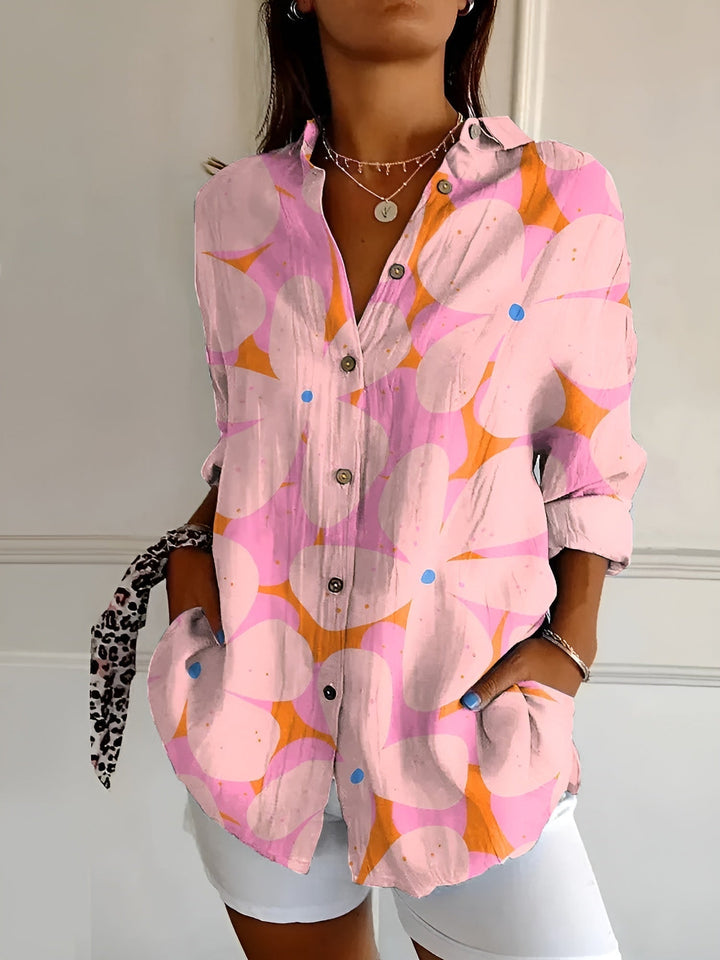 Comfortable women's relaxed fit button-up blouse. Versatile long sleeve V-neck for everyday casual wear.
