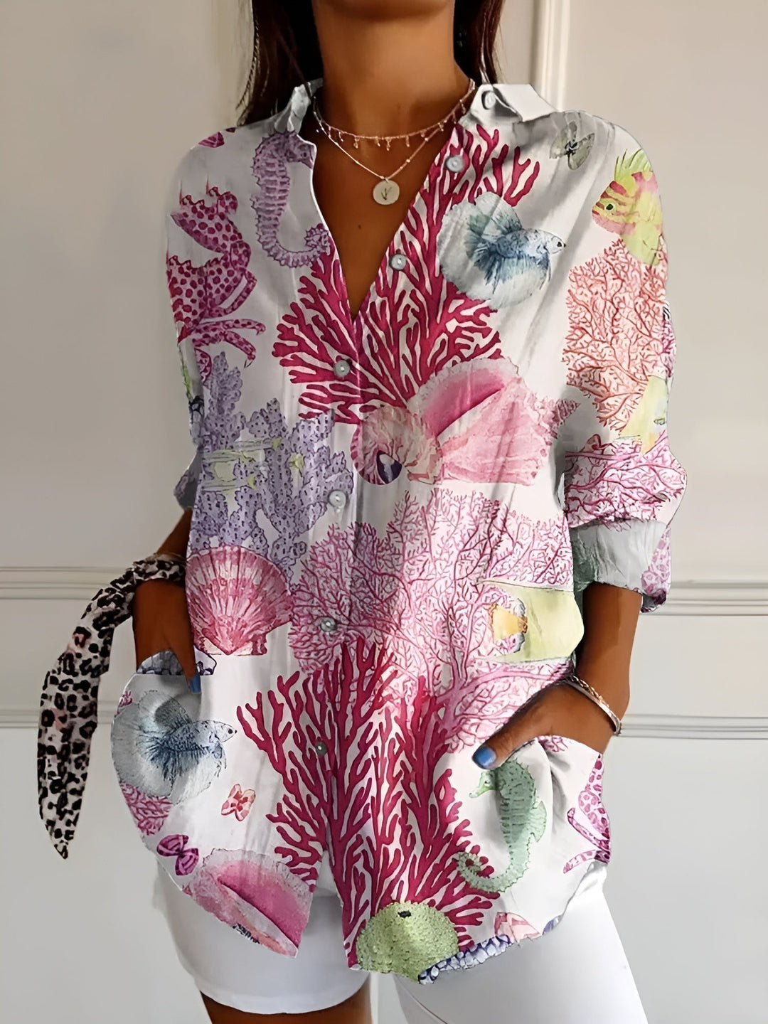 Versatile women's button-up blouse, long sleeve, V-neck. Relaxed fit for all-day comfort, perfect for work or casual.