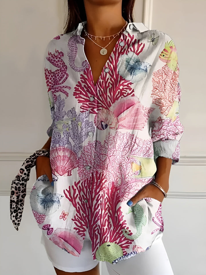 Versatile women's button-up blouse, long sleeve, V-neck. Relaxed fit for all-day comfort, perfect for work or casual.