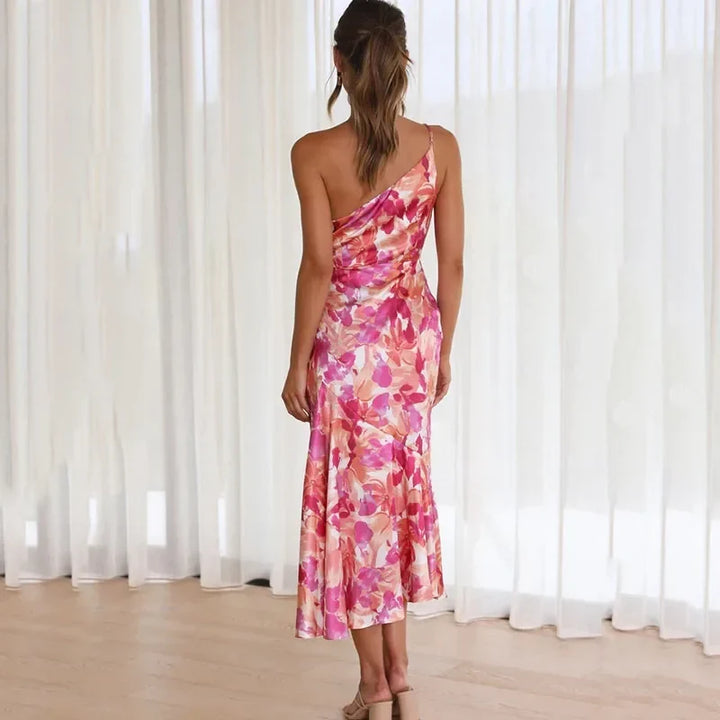 Fashionable women's asymmetrical one-shoulder floral midi dress, ideal for elegant party or occasion wear.
