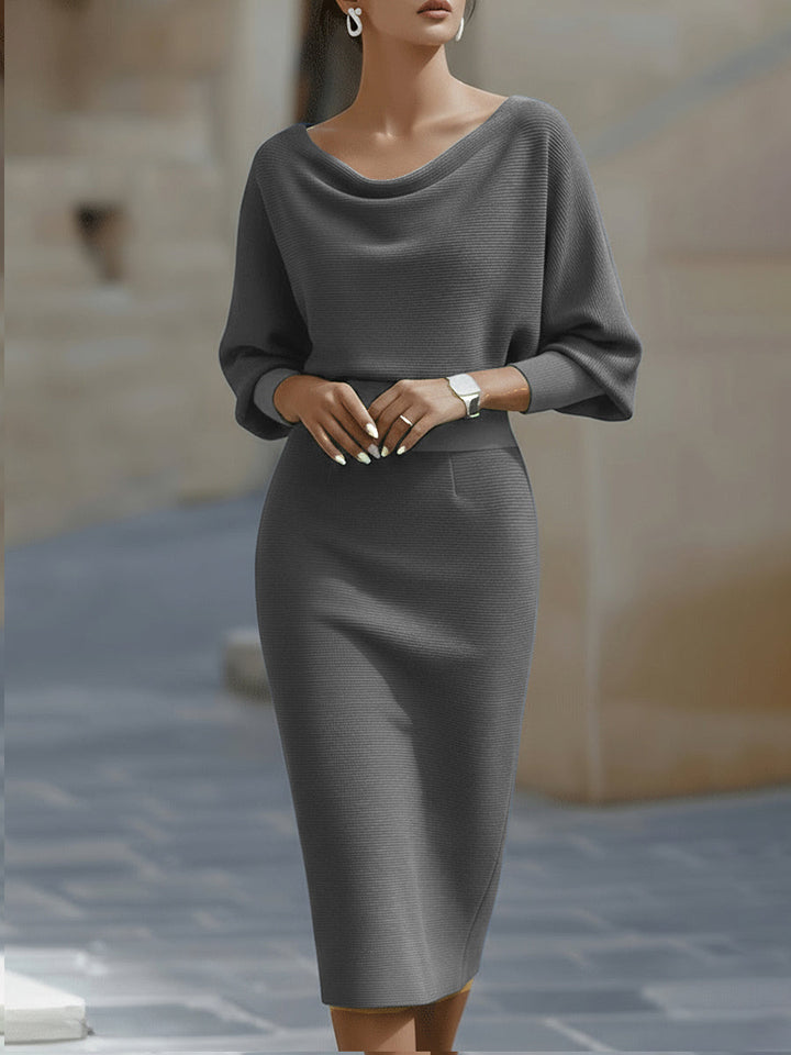 Chic batwing sleeve midi dress, perfect for work or cocktails.