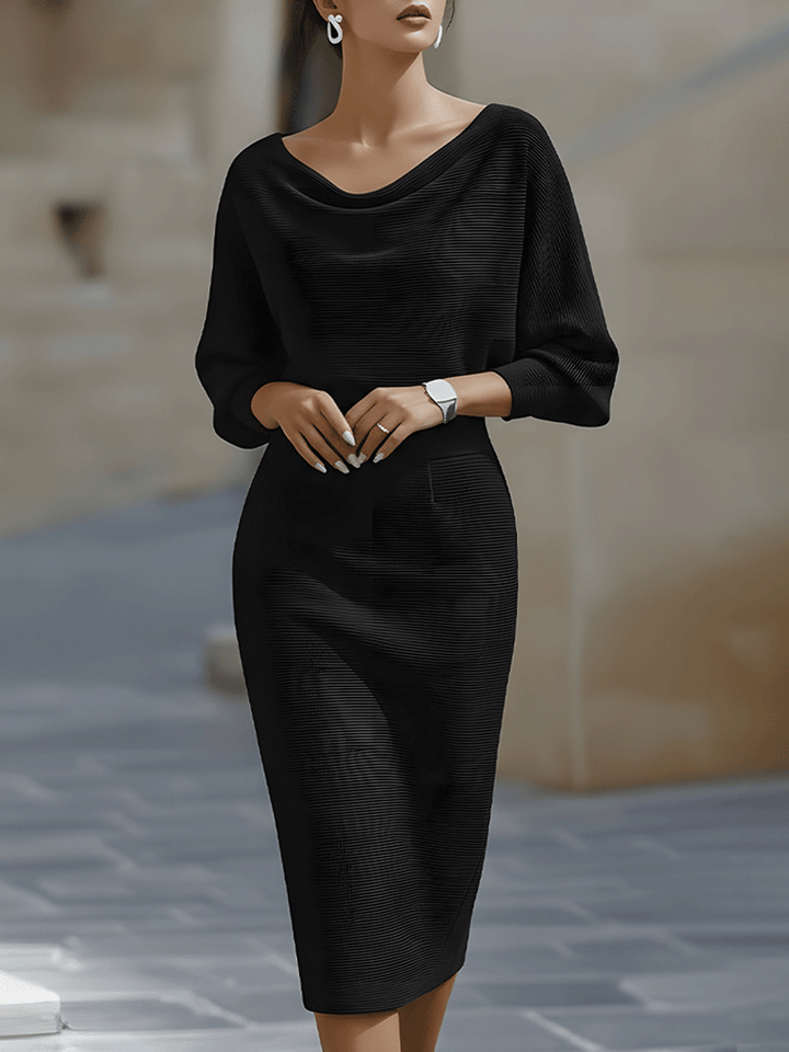 Feminine and elegant midi dress with draped batwing sleeves.