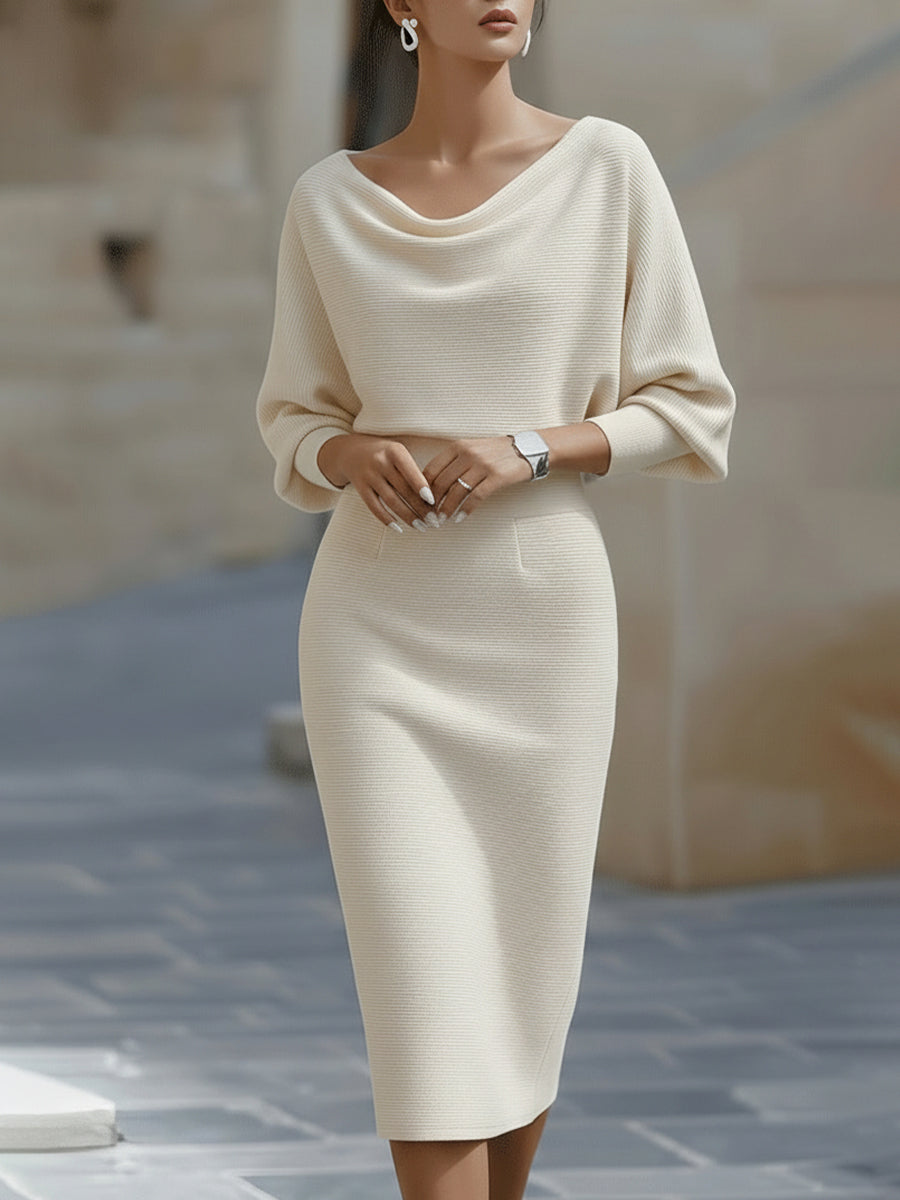 Stylish cowl neck midi dress with elegant batwing sleeves.
