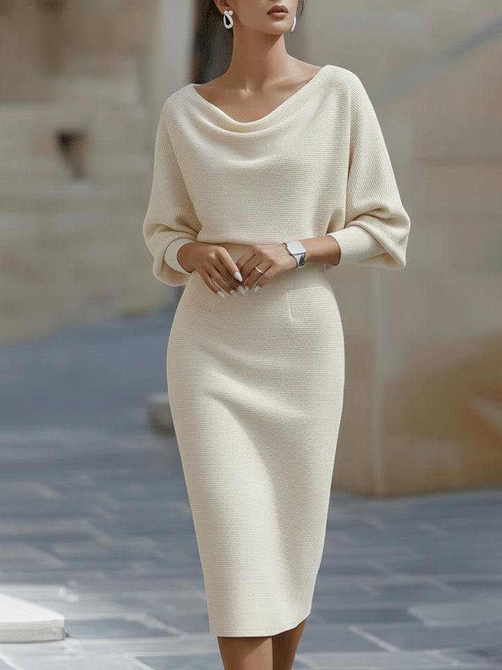 Stylish cowl neck midi dress with elegant batwing sleeves.