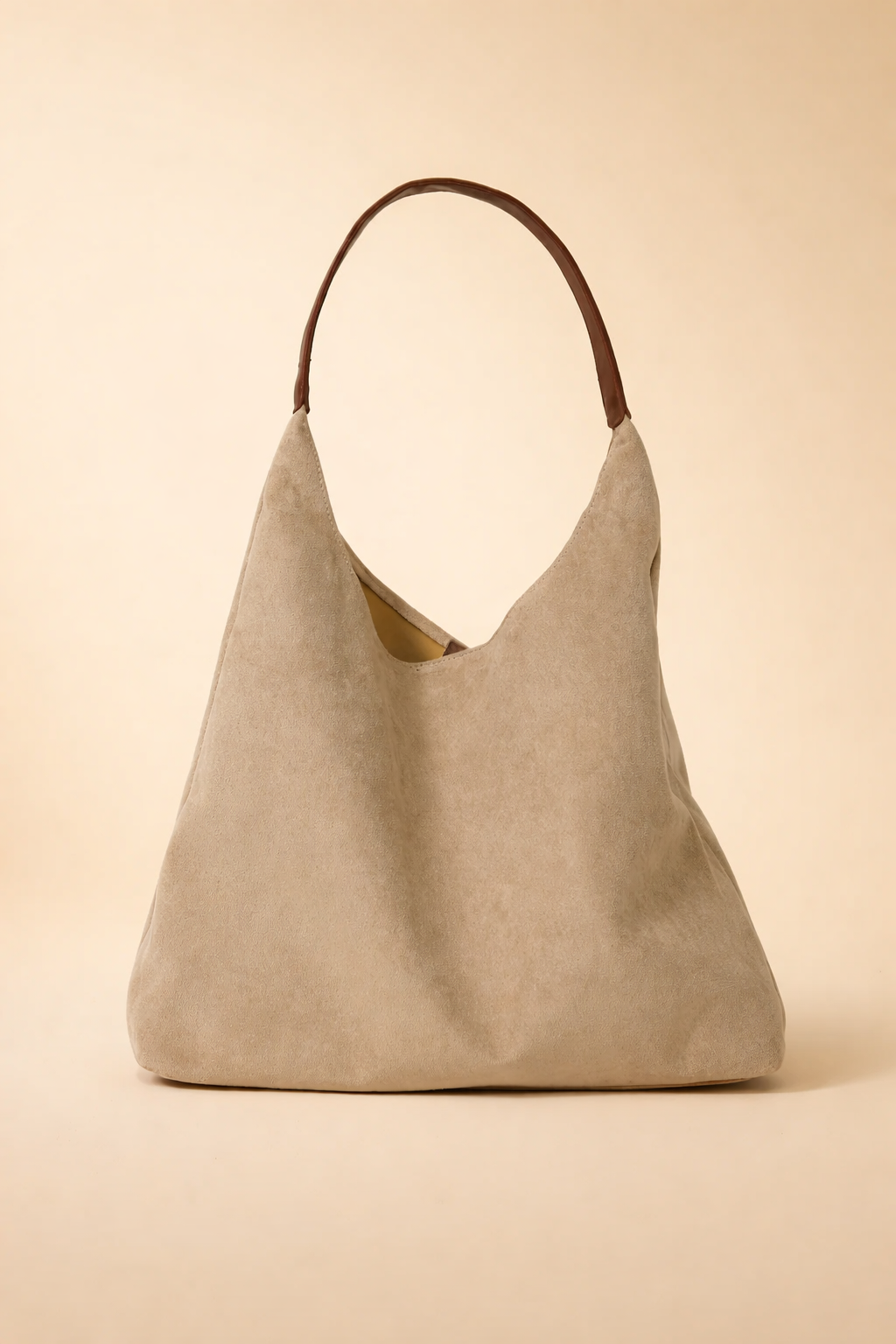 Comfortable women's everyday hobo bag. Soft suede shoulder bag, a versatile minimalist handbag for effortless style.