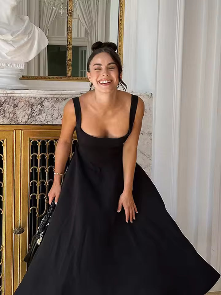 Sophisticated black evening dress, a stylish midi formal option for women.
