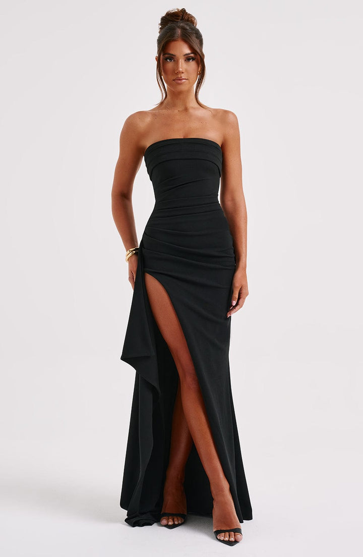 Chic black strapless maxi dress with a sexy high slit, designed for elegant women's evening wear and party fashion.
