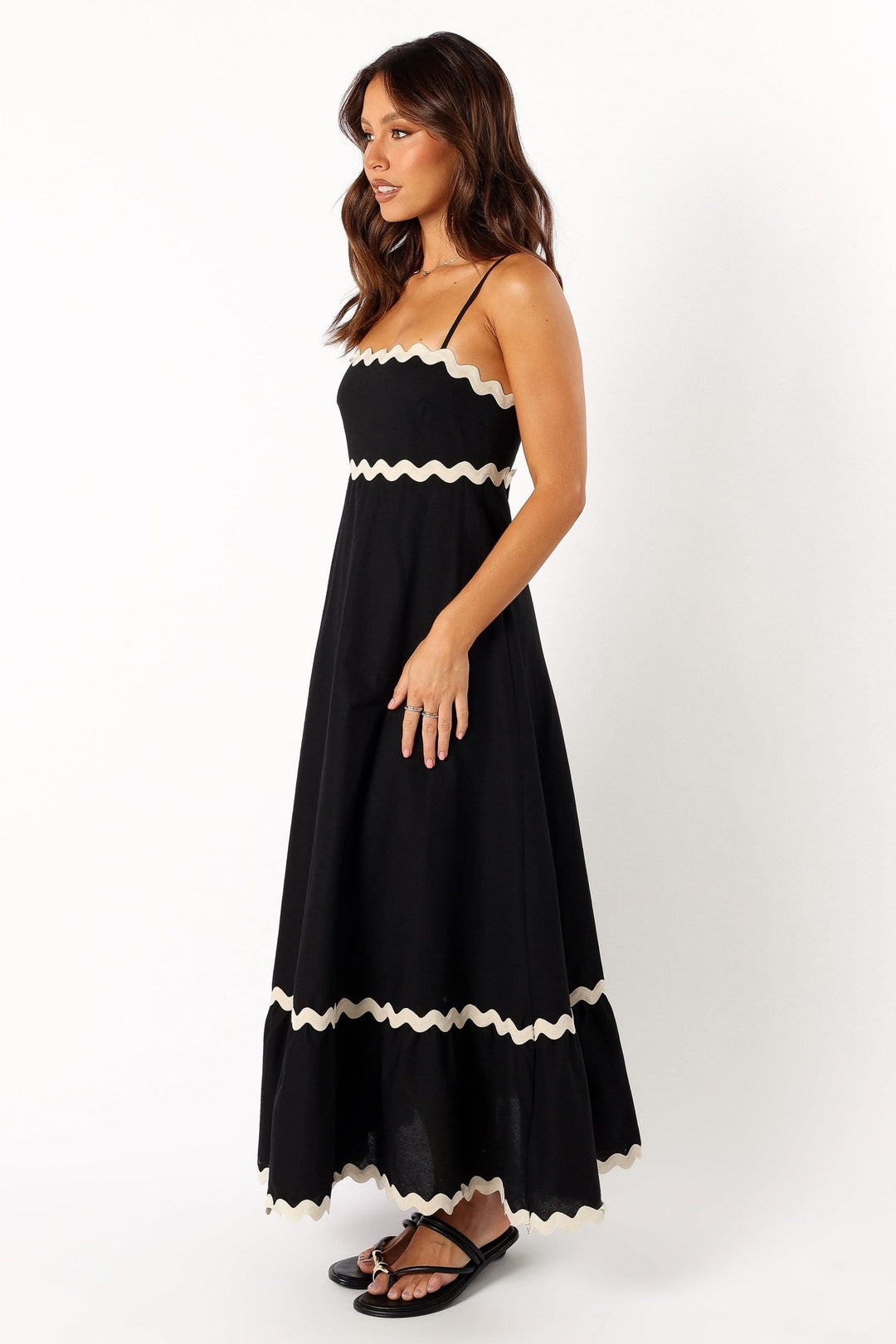 Elegant black strappy maxi dress for women, ideal for summer evenings, resort wear, or casual style.