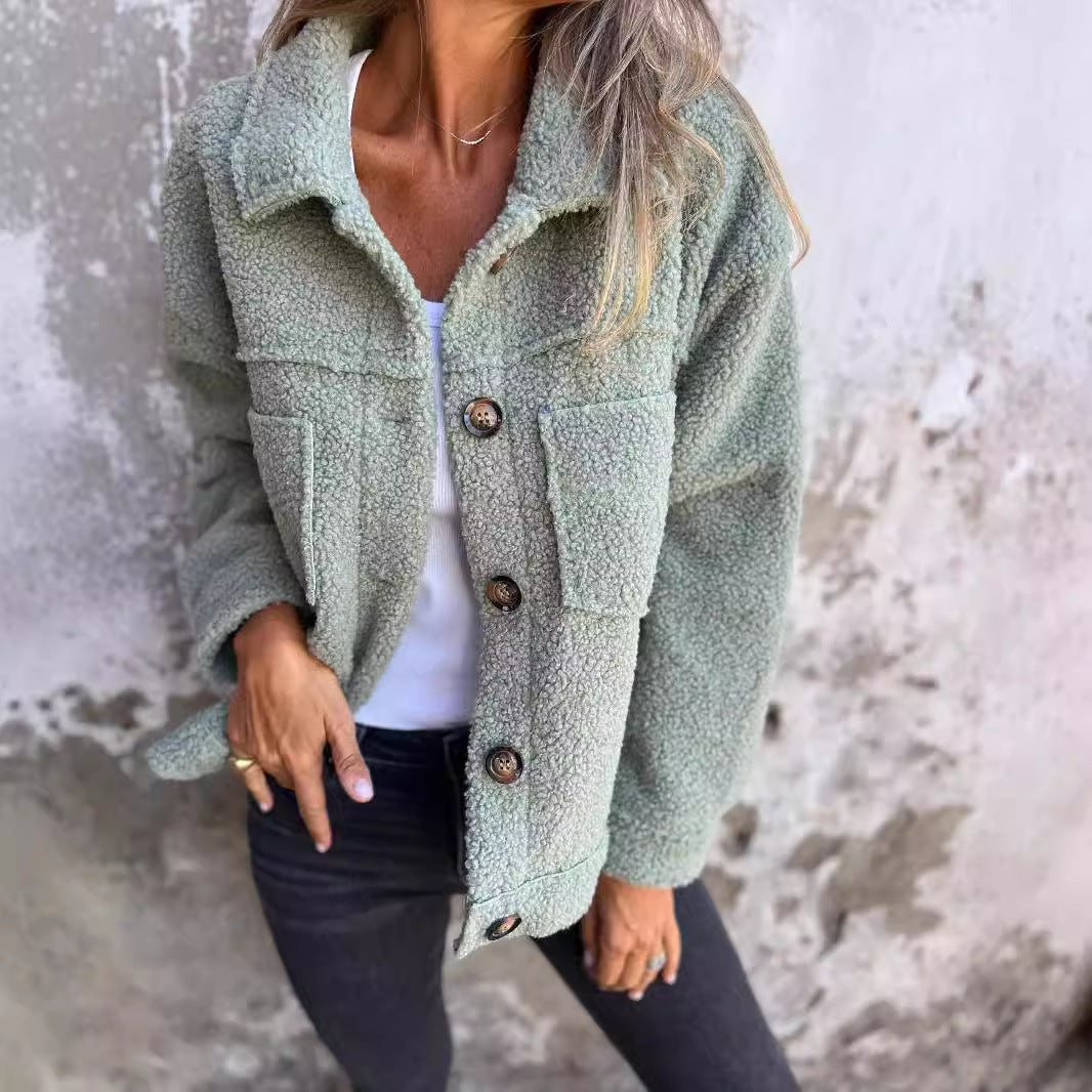 Elegant black women's winter coat with button closure. Cozy & stylish outerwear perfect for fall and winter fashion.