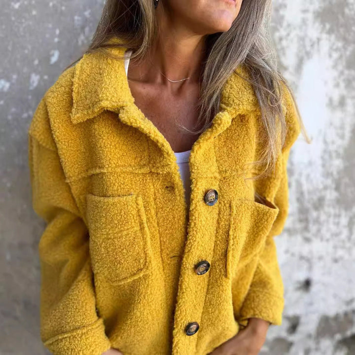 Chic yellow women's elegant winter coat. Stylish long sleeve outerwear with button closure for fall & winter.