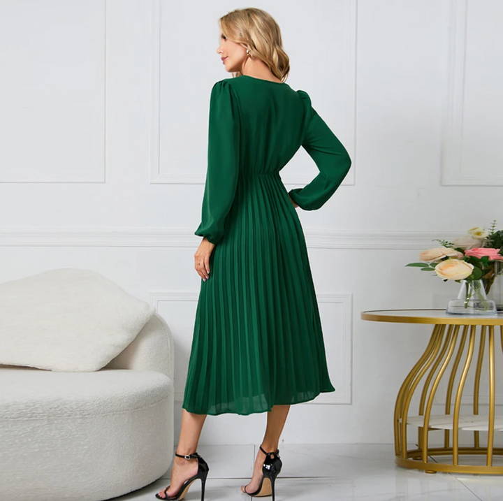 Versatile knee-length blazer dress for women, elegant button-front design, suitable for business or evening events.