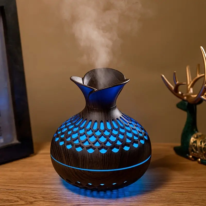 Modern essential oil diffuser in black, enhancing bedroom ambiance and stress relief.