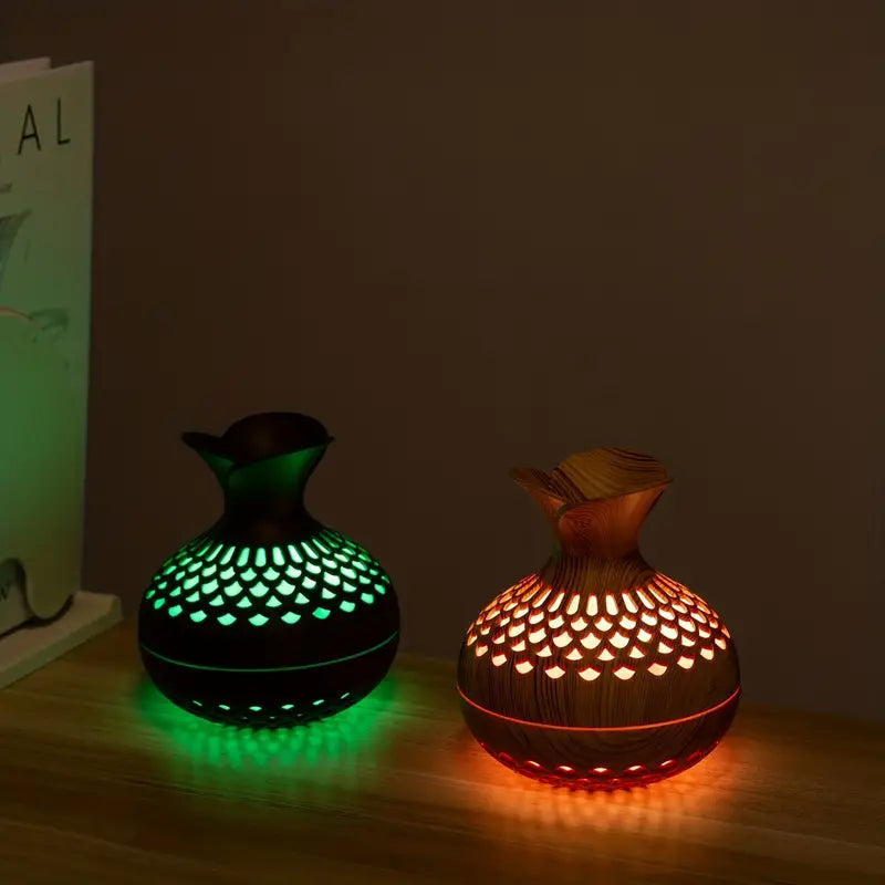 Close-up of an elegant aroma diffuser releasing a fine mist for a calming atmosphere.