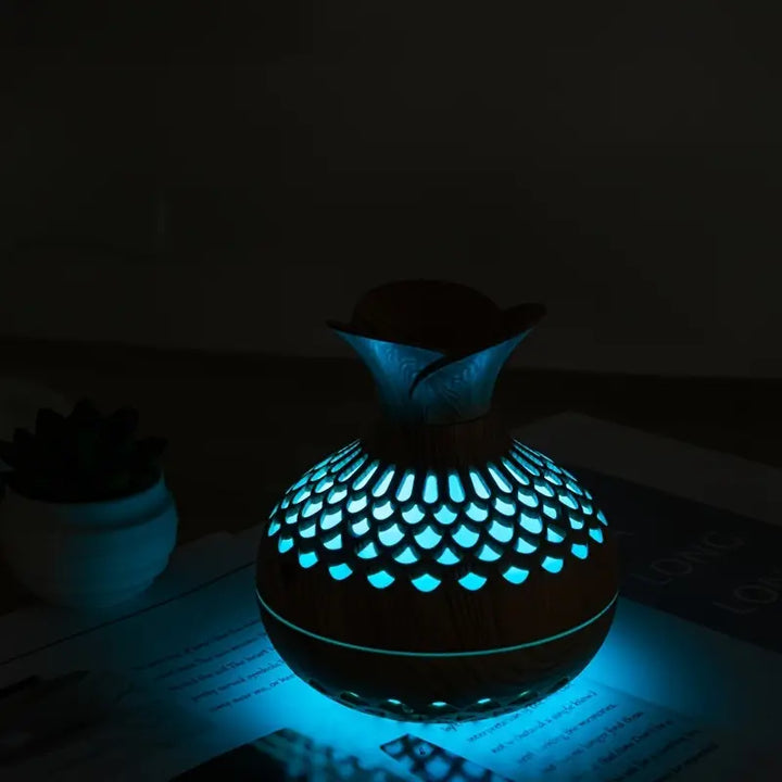 Compact aroma diffuser, ideal for small spaces and promoting stress relief.