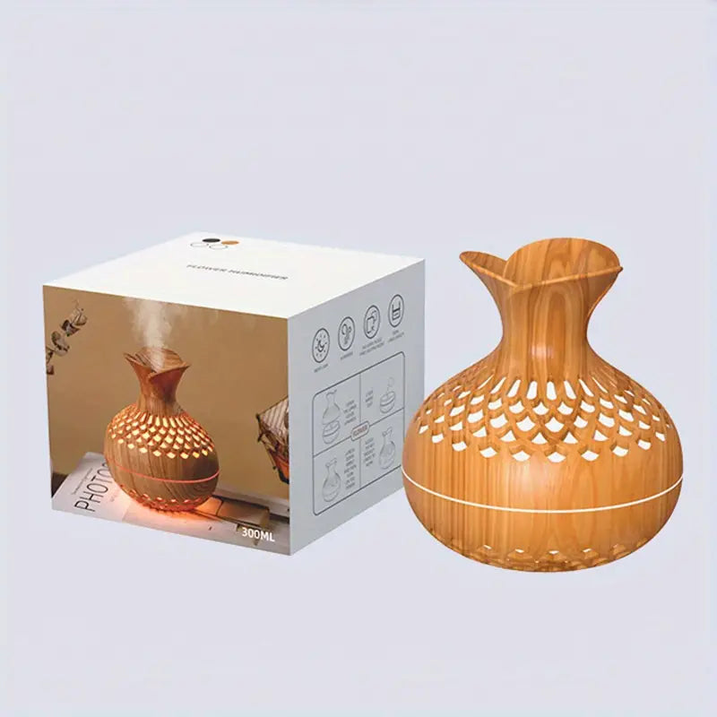 User enjoying the calming mist from an essential oil diffuser for ultimate relaxation.