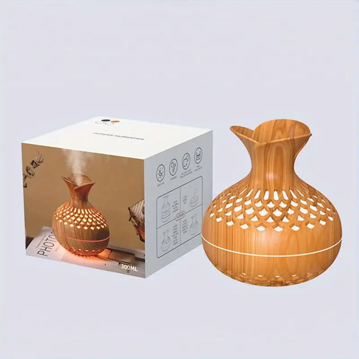 User enjoying the calming mist from an essential oil diffuser for ultimate relaxation.