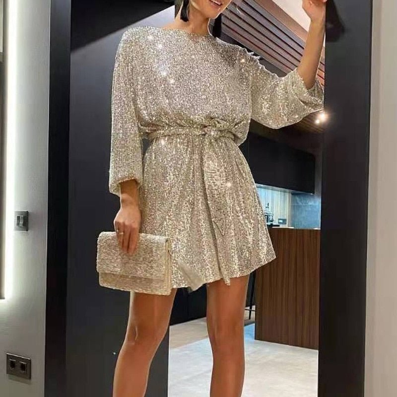 Women's loose fit Clara party dress, offering comfortable, effortless style. Ideal for summer cocktails and events.