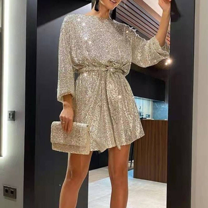 Women's loose fit Clara party dress, offering comfortable, effortless style. Ideal for summer cocktails and events.