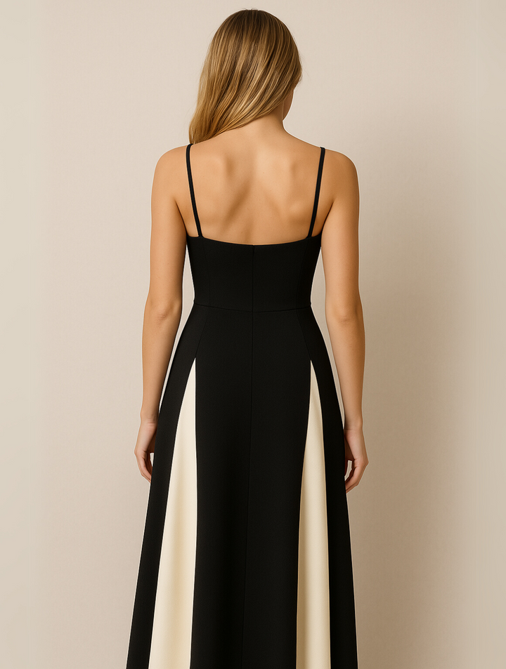 Classic women's formal black maxi dress, designed with an elegant contrast panel for a chic, flattering look.