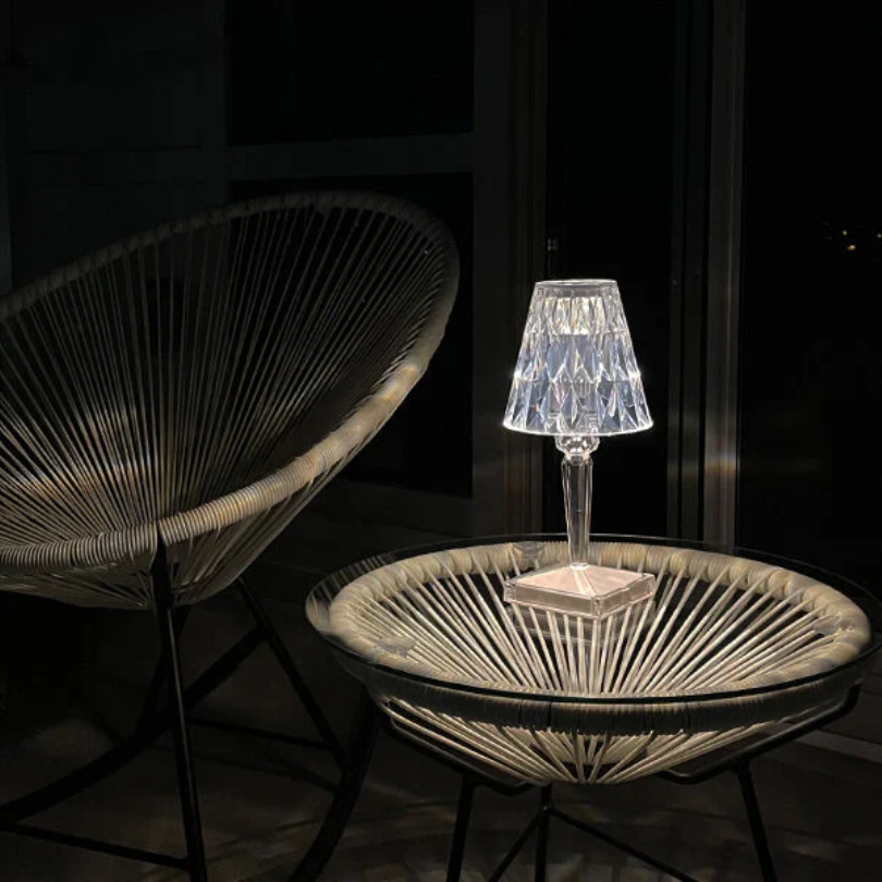 Modern crystal table lamp with a beautiful glow, ideal accent lighting for any room.