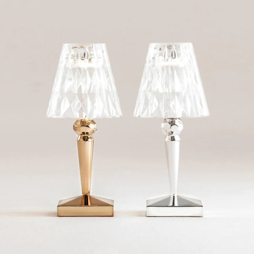 Stylish crystal table lamp on a nightstand, adding elegance to bedroom decor.
