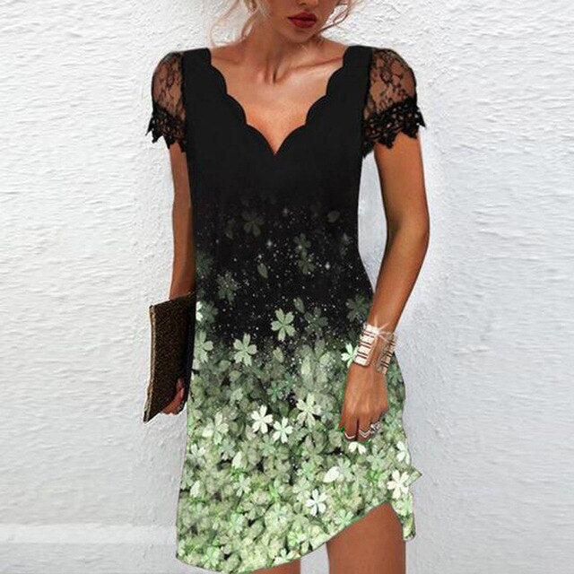 Front view: Women's elegant cocktail dress with intricate details, perfect for a party or special occasion.
