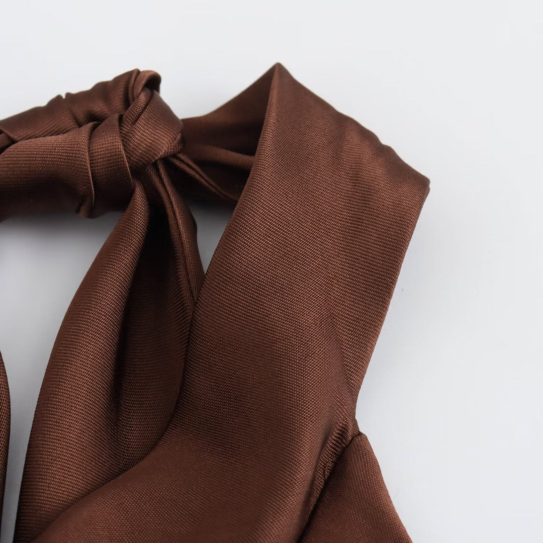 Simple yet elegant brown halter midi dress for women, a sophisticated choice for evening party wear and events.