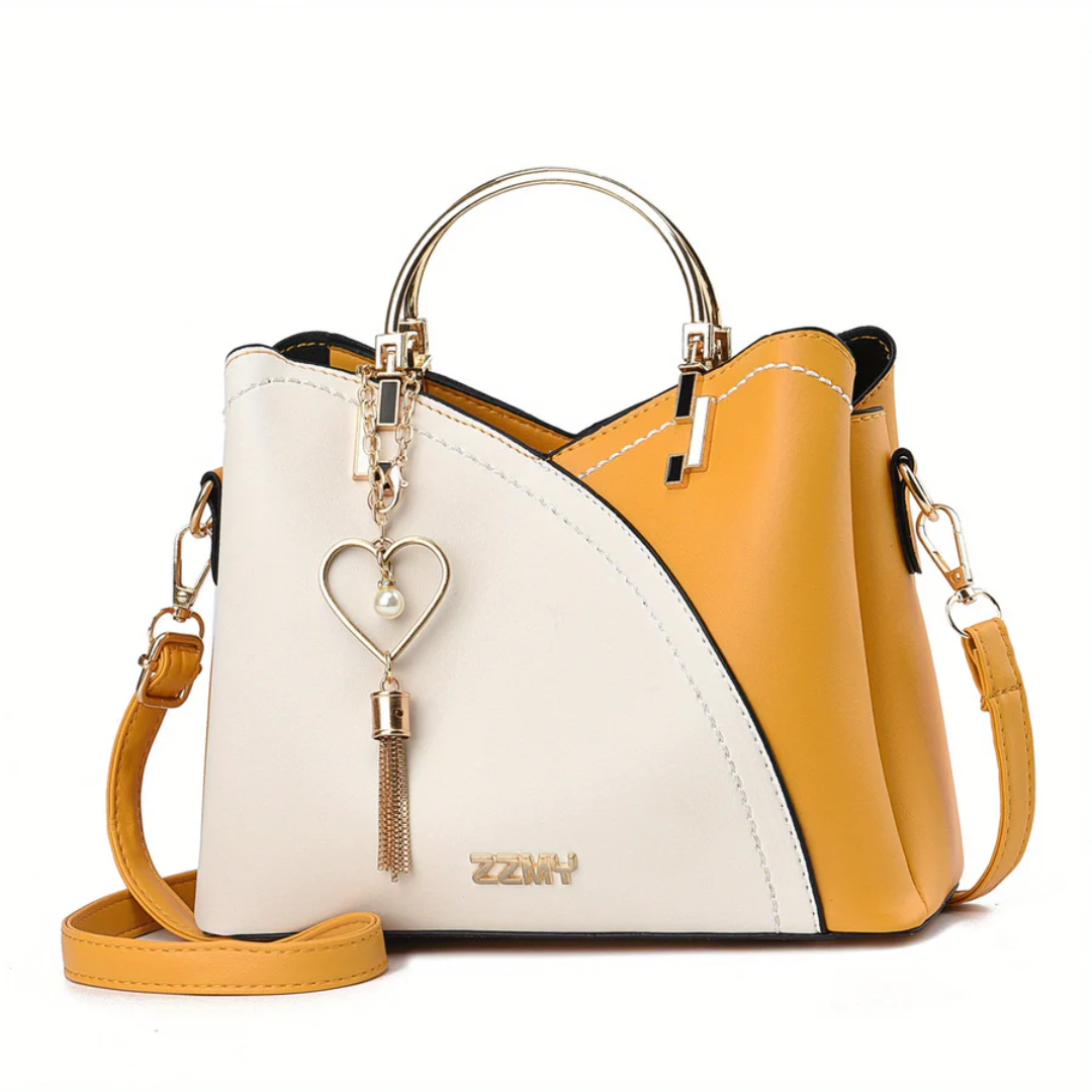 Crisp white faux leather shoulder bag, versatile and fresh women's accessory.