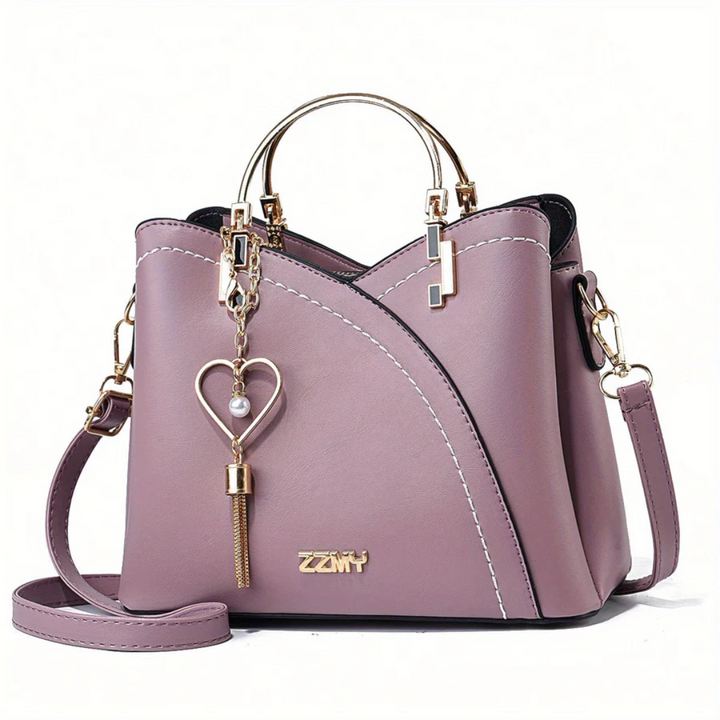 Deep blue elegant faux leather handbag, sophisticated women's fashion choice.