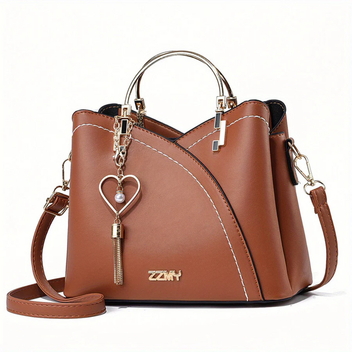 Front view: Elegant women's faux leather shoulder bag, sleek design and durable.
