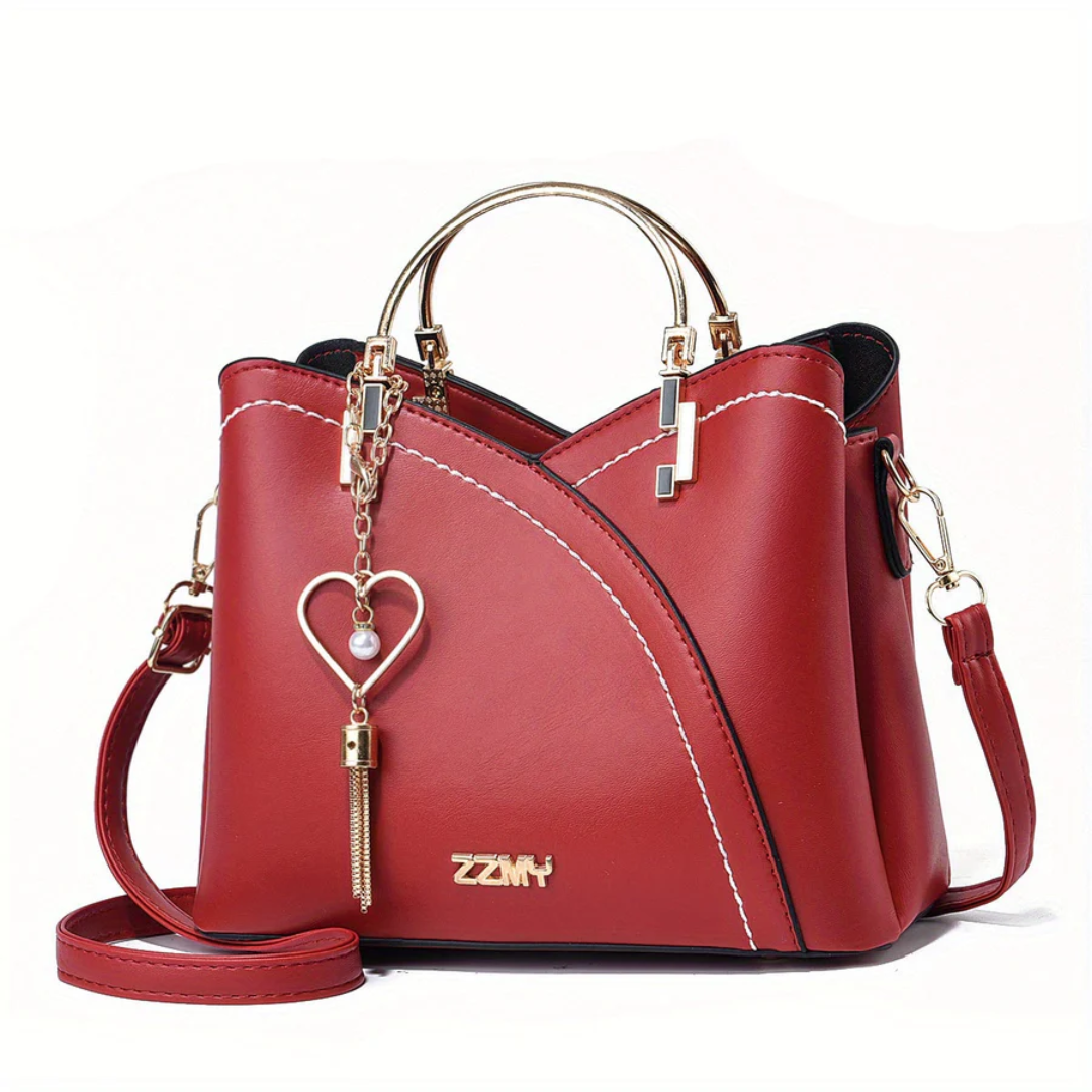 Side view of chic faux leather handbag, ample space for women's essentials.
