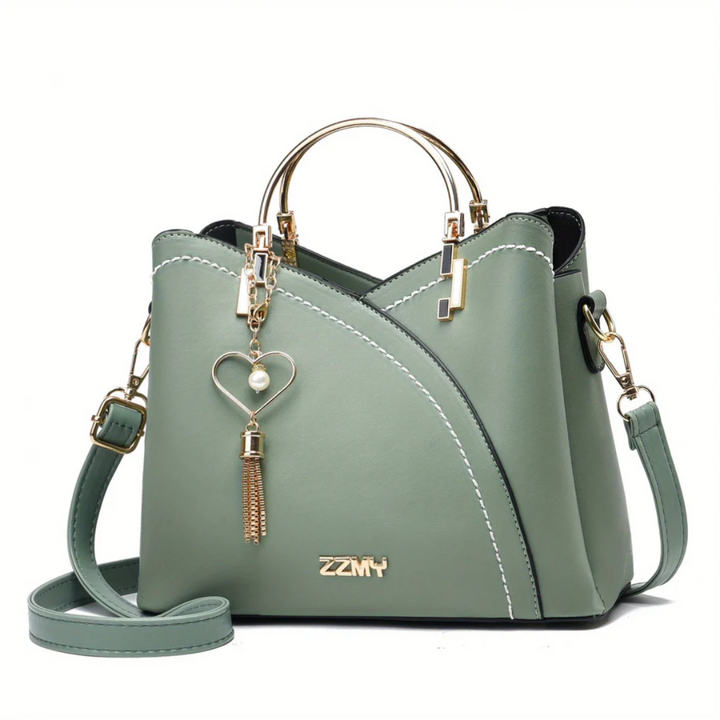 Interior of versatile faux leather handbag, organized compartments for women.