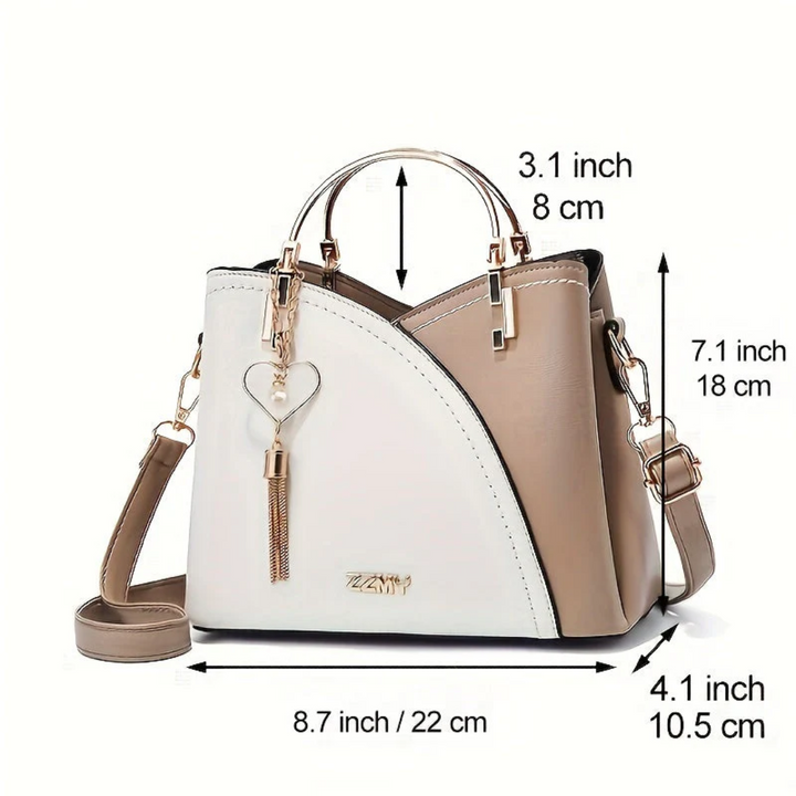 Sophisticated women's faux leather tote bag, perfect for work or leisure.