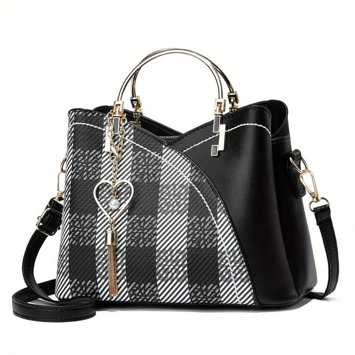 Modern beige faux leather tote bag, chic and adaptable for women.