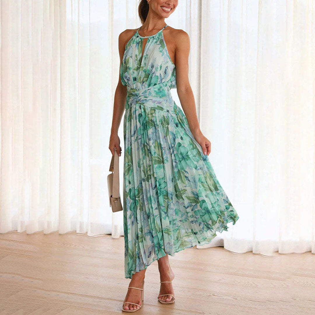 Elegant women's green floral maxi dress with flowy fabric, perfect for effortless summer style.