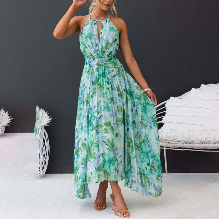 Versatile women's green floral maxi dress with a halter neck, suitable for casual or elegant wear.