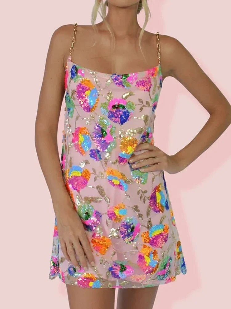 Women's elegant floral summer dress with spaghetti straps, A-line silhouette, perfect for warm weather.