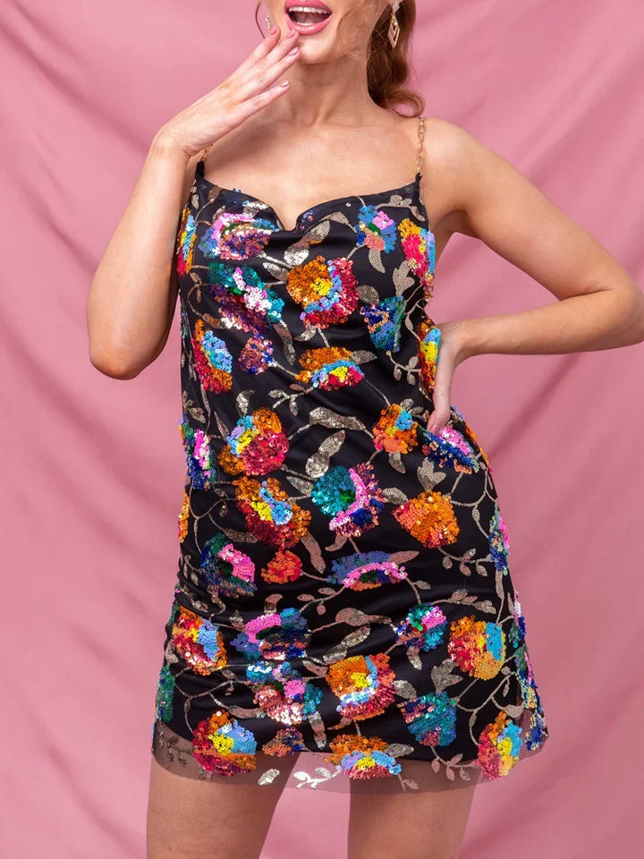 Vibrant floral summer dress for women, A-line cut & spaghetti straps, ideal for parties, casual, or vacation.